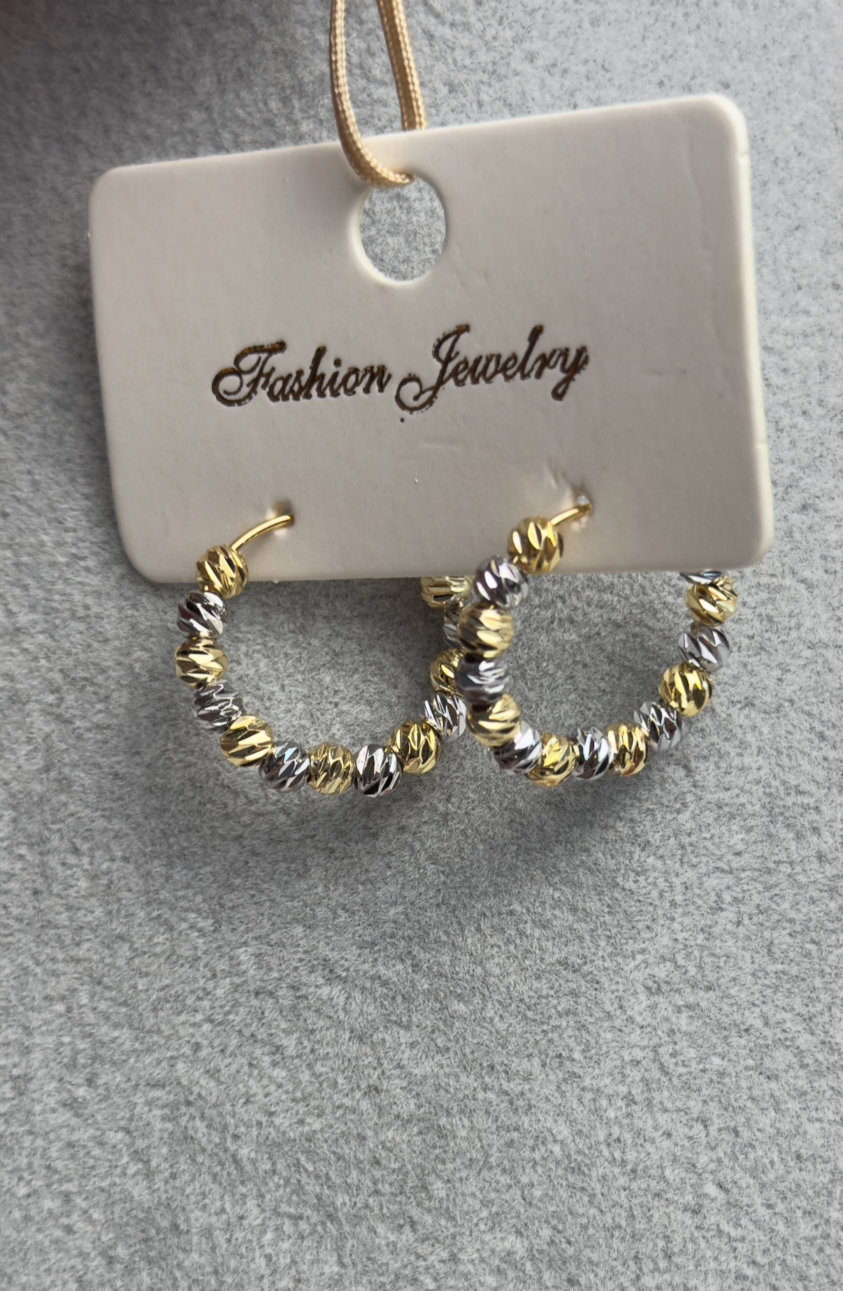 Boucle d'oreille à perle