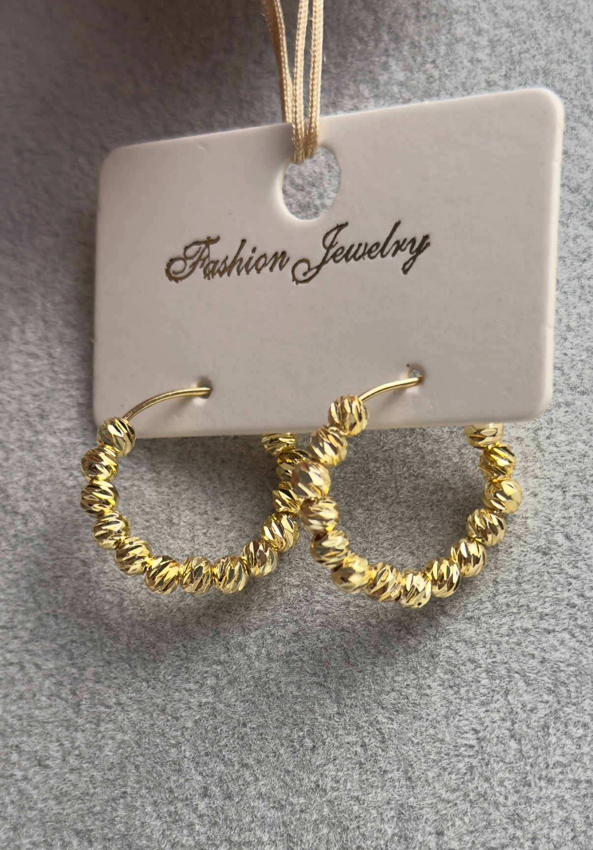 Boucle d'oreille à perle