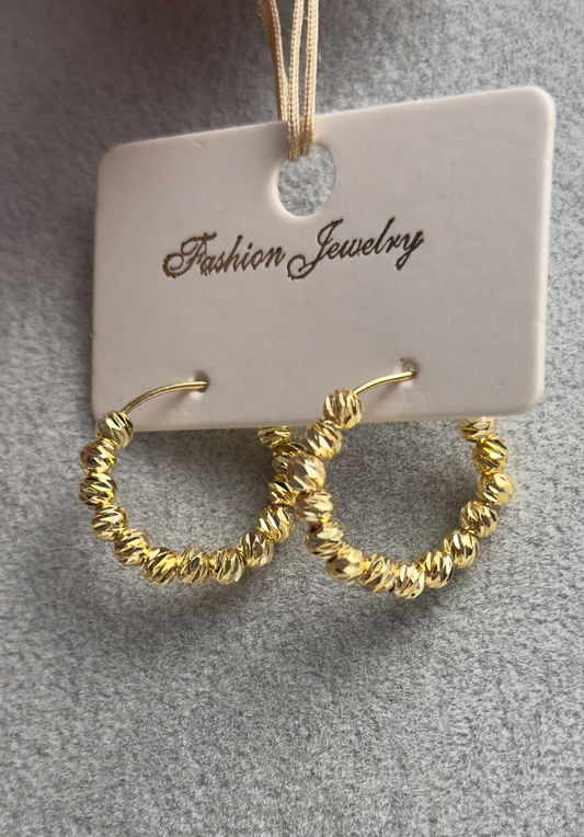 Boucle d'oreille à perle